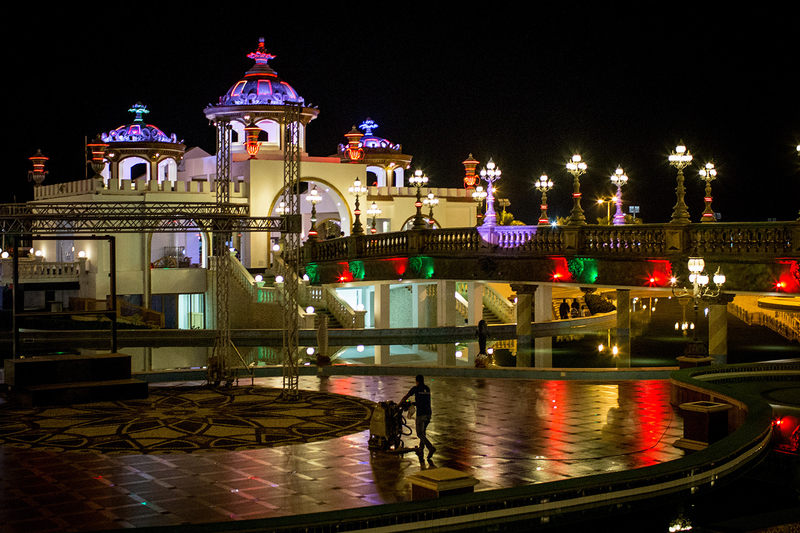 A man cleans the floor at a tourist amusement park (Photo: Chris McGrath/Getty Images)